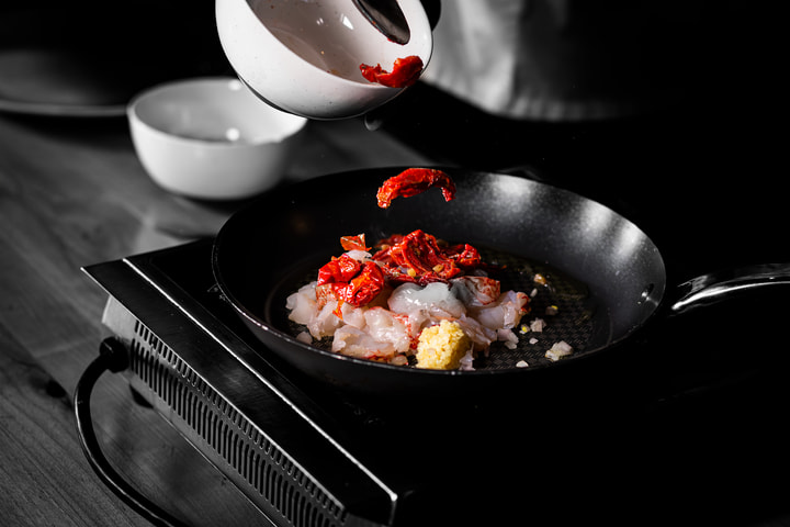 Tomatoes poured into a pan