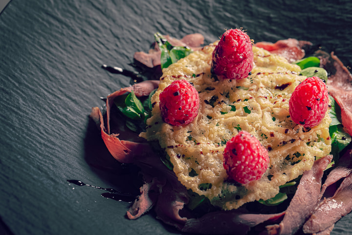 Raspberries on a dish, close view