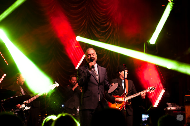 Band under red and green beams